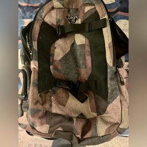 Used - Dakine Misson 25L backpack.  Camo